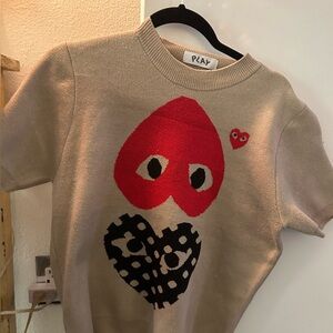 Women’s Play COMME des GARCON Short sleeve sweater.